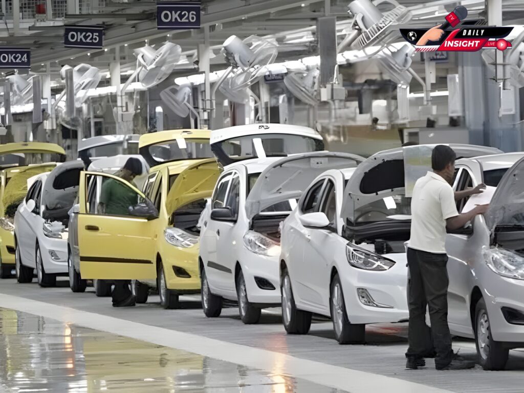 Production of cars in factory.